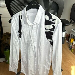 Dress shirt lightly used fits like a standard Large